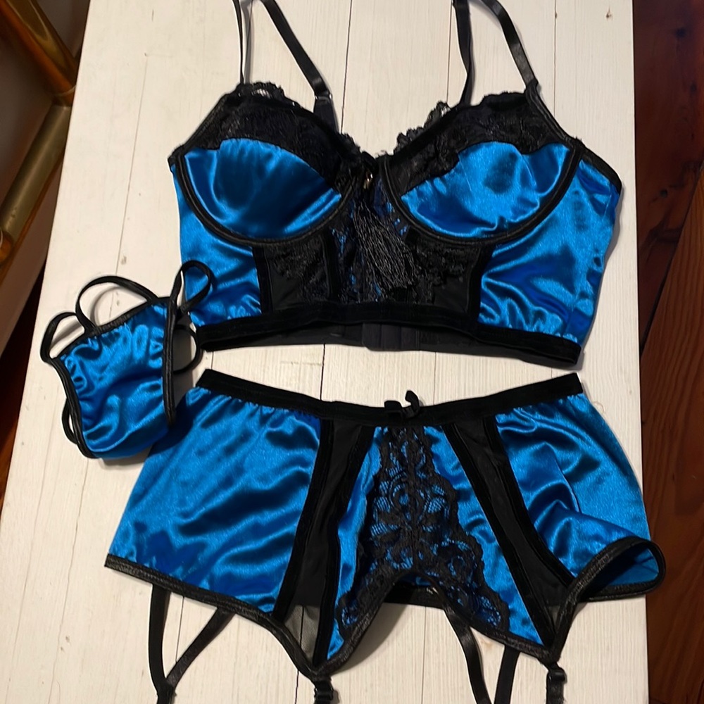 Three piece satin lingerie set.